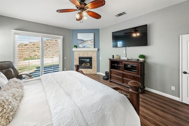 bedroom with baseboards, access to outside, visible vents, and dark wood-style flooring