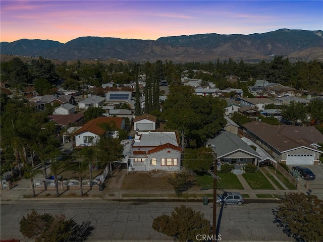 bird's eye view with a residential view and a mountain view