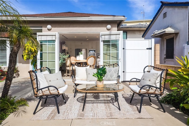 view of patio / terrace with a gate