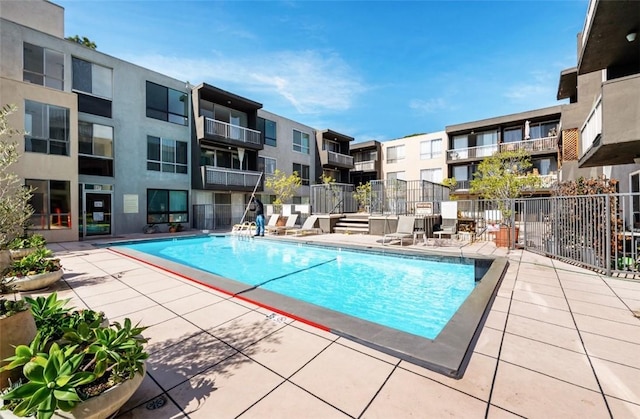 1745 Camino Palmero St Unit 537, Los Angeles, CA 90046 - community pool featuring a patio and a residential view