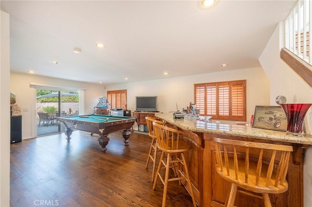 recreation room with pool table, a bar, dark wood finished floors, and recessed lighting