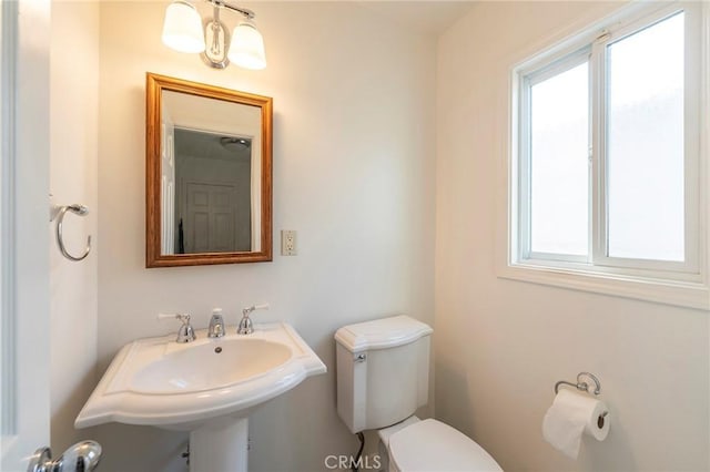 bathroom featuring a sink and toilet