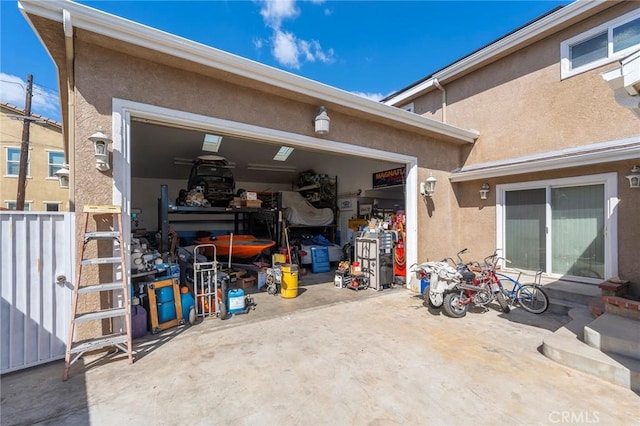 garage with fence