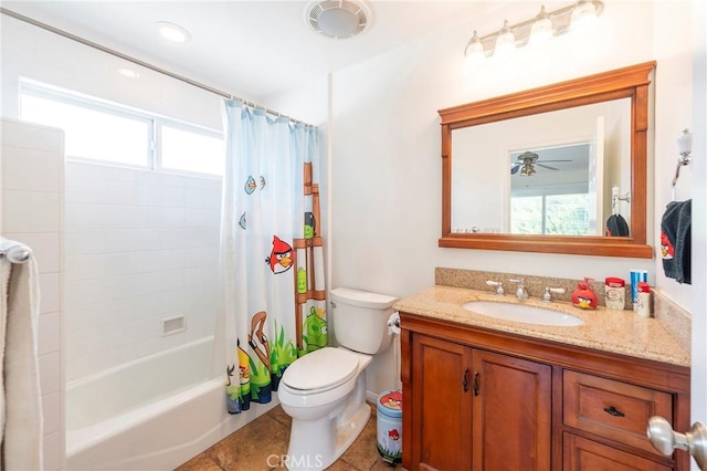 full bathroom featuring toilet, tile patterned floors, vanity, and shower / bathtub combination with curtain