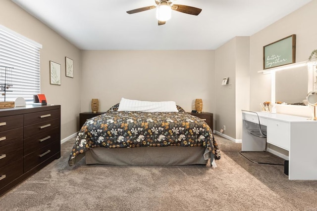 bedroom with carpet floors, a ceiling fan, and baseboards