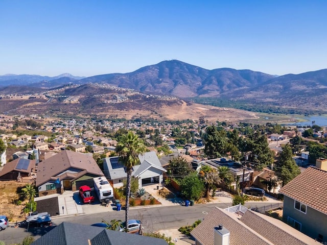 bird's eye view featuring a residential view and a mountain view