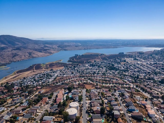 bird's eye view featuring a residential view and a water view