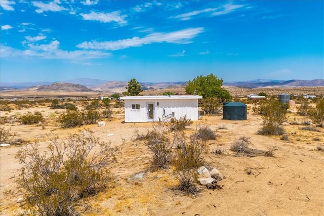 view of front of property featuring an outbuilding and a mountain view