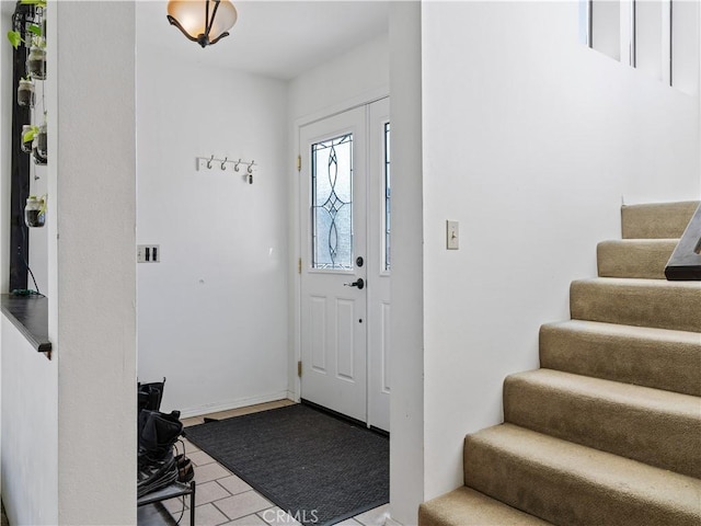 entrance foyer featuring stairs