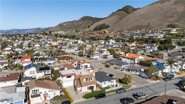 bird's eye view with a residential view and a mountain view
