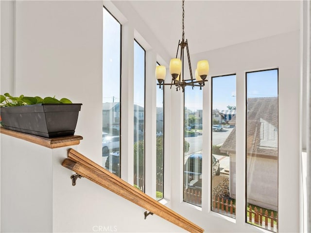 interior space featuring a chandelier
