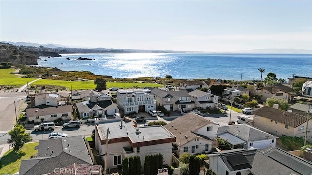 bird's eye view with a water view and a residential view