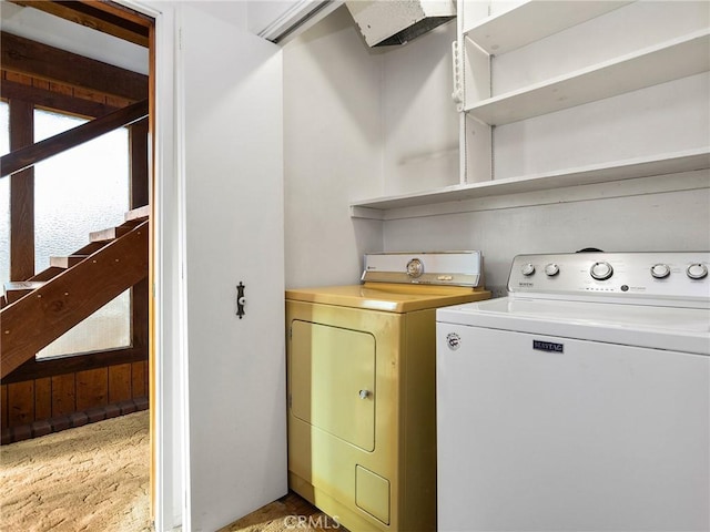 washroom with laundry area and washer and clothes dryer