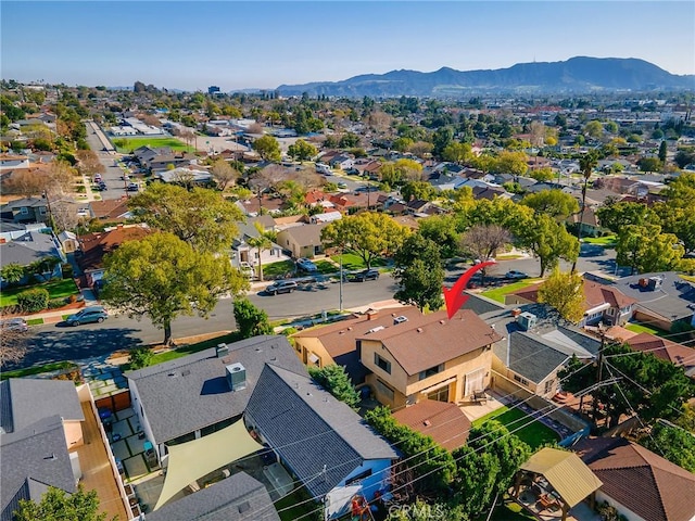 bird's eye view featuring a residential view and a mountain view