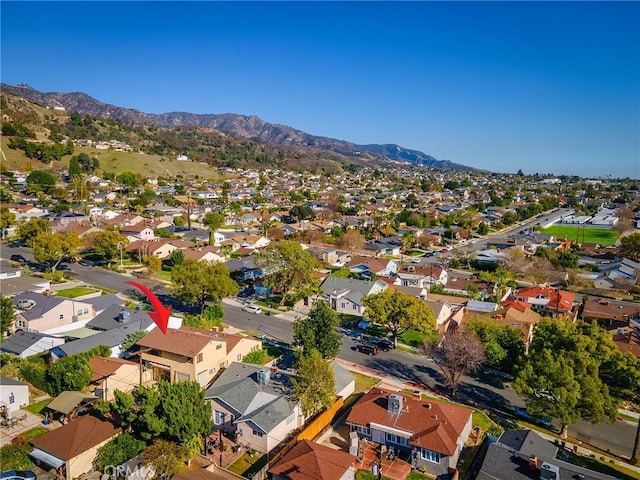 bird's eye view with a residential view and a mountain view