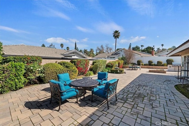 view of patio featuring fence