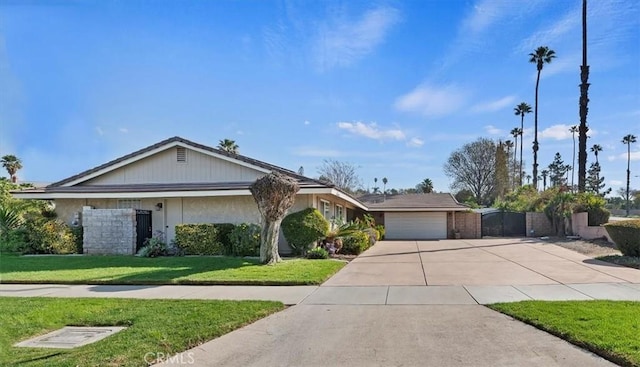 single story home with driveway, a front lawn, an attached garage, and a gate