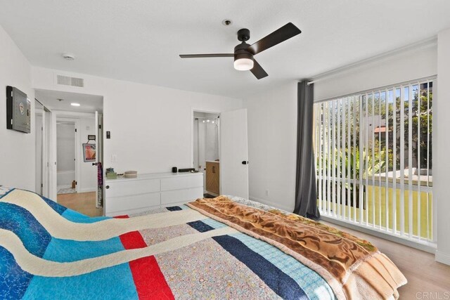 bedroom featuring baseboards and ceiling fan