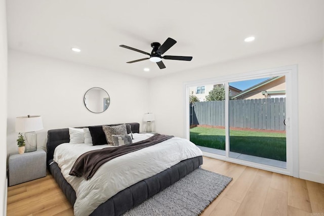 bedroom with light wood-type flooring, access to outside, ceiling fan, and recessed lighting