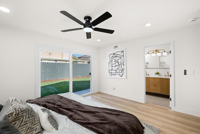 bedroom featuring ensuite bathroom, recessed lighting, visible vents, baseboards, and light wood-type flooring