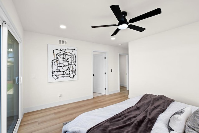 bedroom featuring visible vents, baseboards, ceiling fan, wood finished floors, and recessed lighting