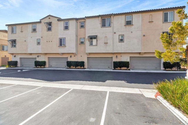 view of building exterior featuring a garage