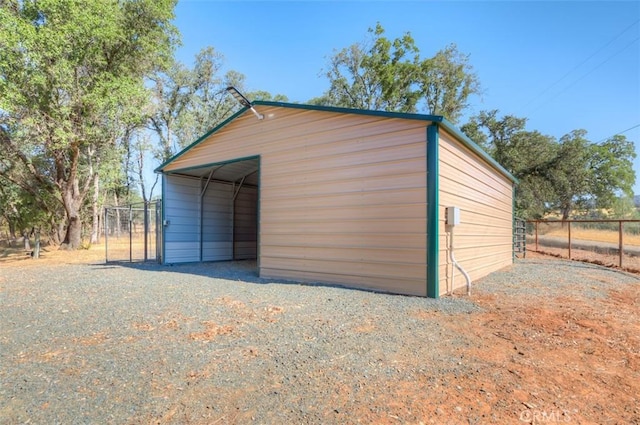 garage featuring fence