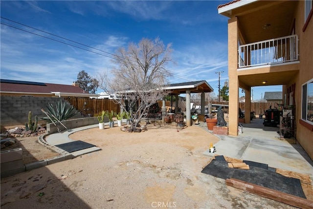 view of yard featuring a patio area and a fenced backyard