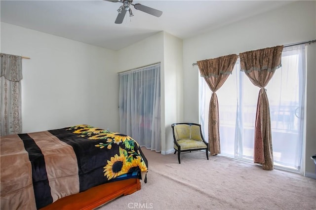 bedroom with carpet and a ceiling fan