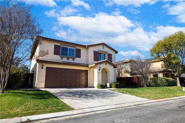 mediterranean / spanish house featuring driveway, a garage, a tile roof, a front lawn, and stucco siding