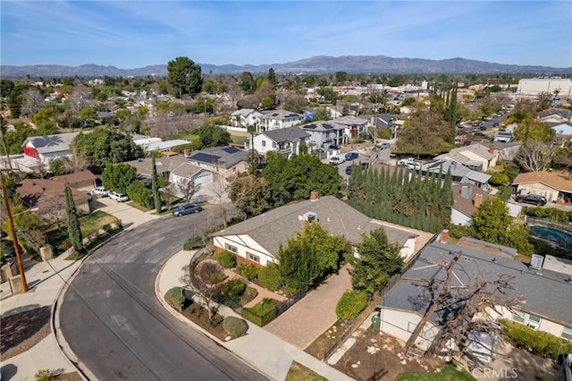 drone / aerial view with a residential view and a mountain view