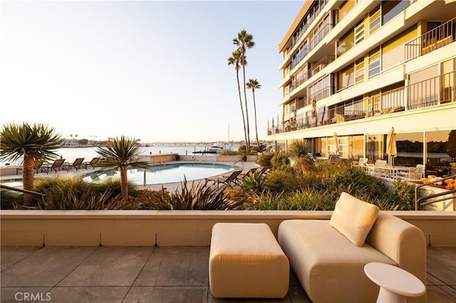 view of patio featuring a community pool