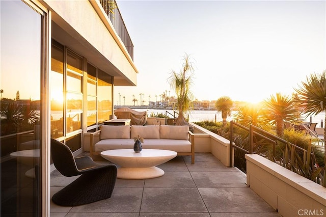 view of balcony at dusk