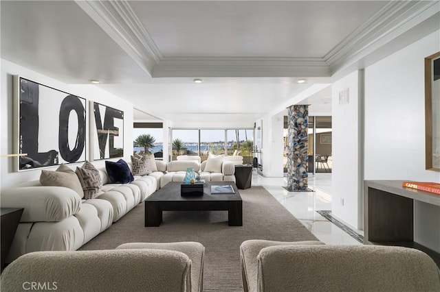living area with marble finish floor, ornamental molding, visible vents, and recessed lighting