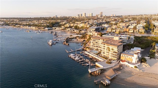 aerial view featuring a water view and a city view