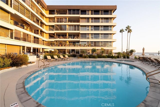pool featuring a patio area