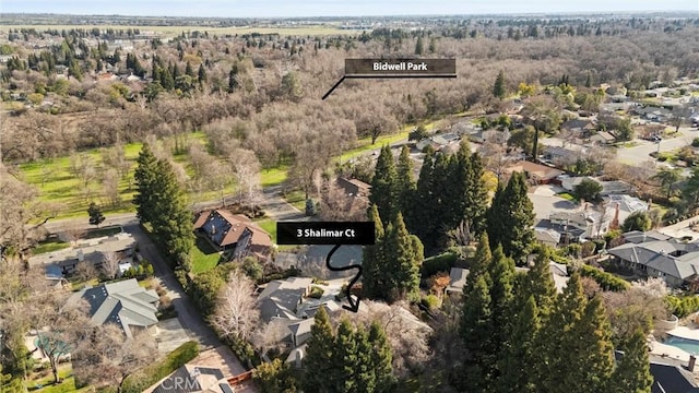 birds eye view of property with a residential view