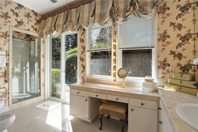 unfurnished office featuring wallpapered walls, light tile patterned floors, and a sink