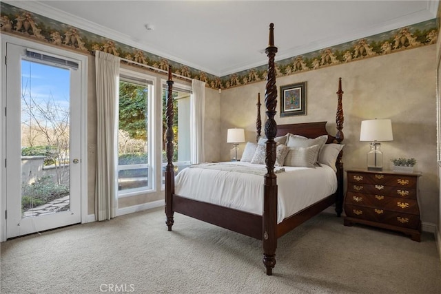 carpeted bedroom with crown molding, baseboards, and access to exterior