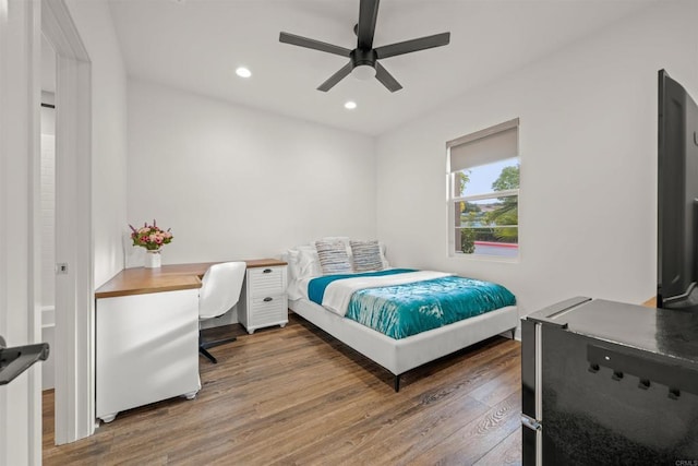 bedroom with dark wood-style floors, ceiling fan, and recessed lighting