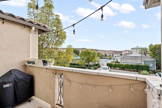 balcony featuring a grill