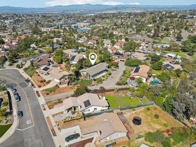 birds eye view of property featuring a residential view and a mountain view