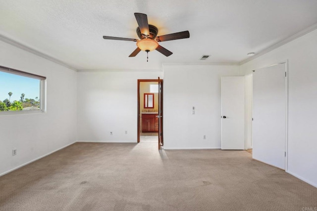 unfurnished room with light carpet, ceiling fan, and visible vents