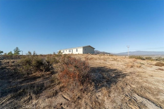 view of yard featuring a rural view