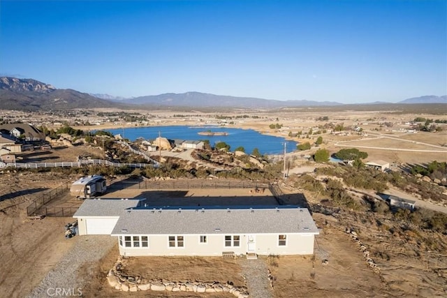 bird's eye view featuring a water and mountain view