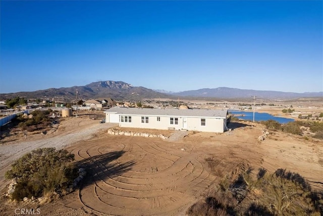 exterior space featuring a mountain view