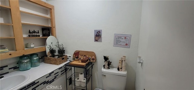 bathroom featuring toilet