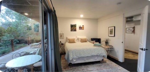 bedroom featuring baseboards