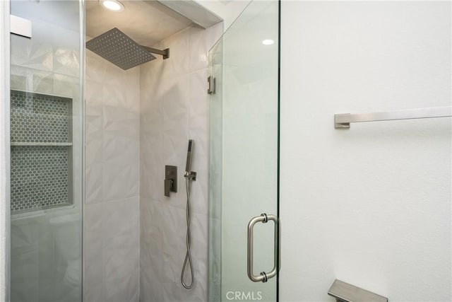 full bath featuring a stall shower