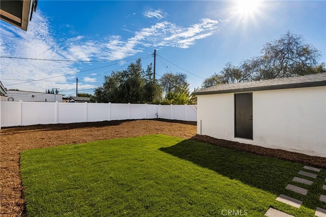 view of yard with fence